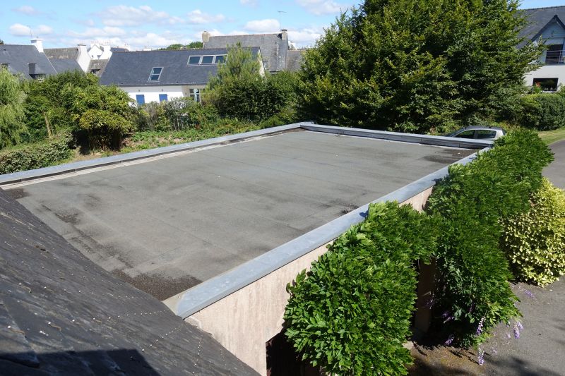 Flat Roof Repair After Storm Or Wind Damage